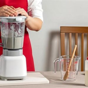 home-chef-preparing-smoothies-or-soups-using-a-blender-with-fresh-ingredients-on-kitchen-countertop-healthy-eating-lifestyle-free-photo